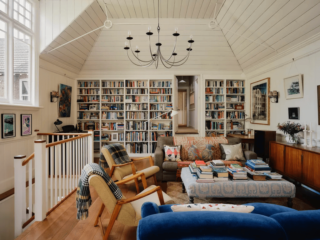 Organized living room and library